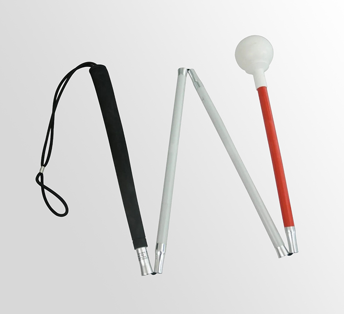 A photo of a folding cane in its folded position.