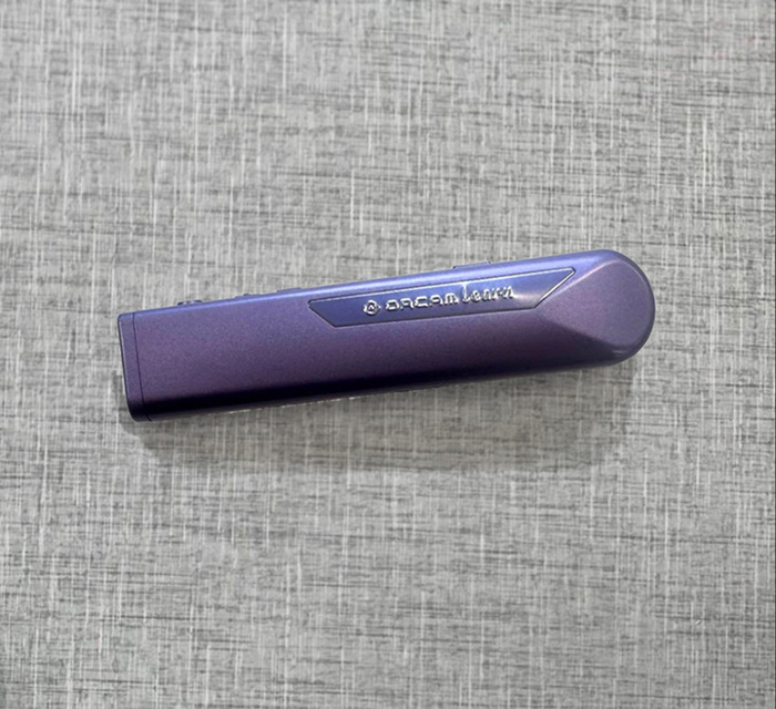 A photo of the OrCam Learn device.