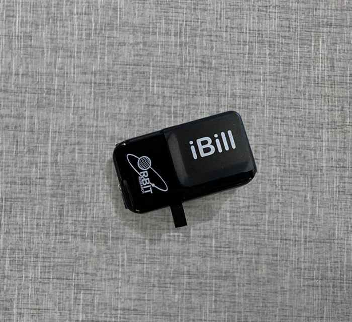 A photo of the iBill currency reader.