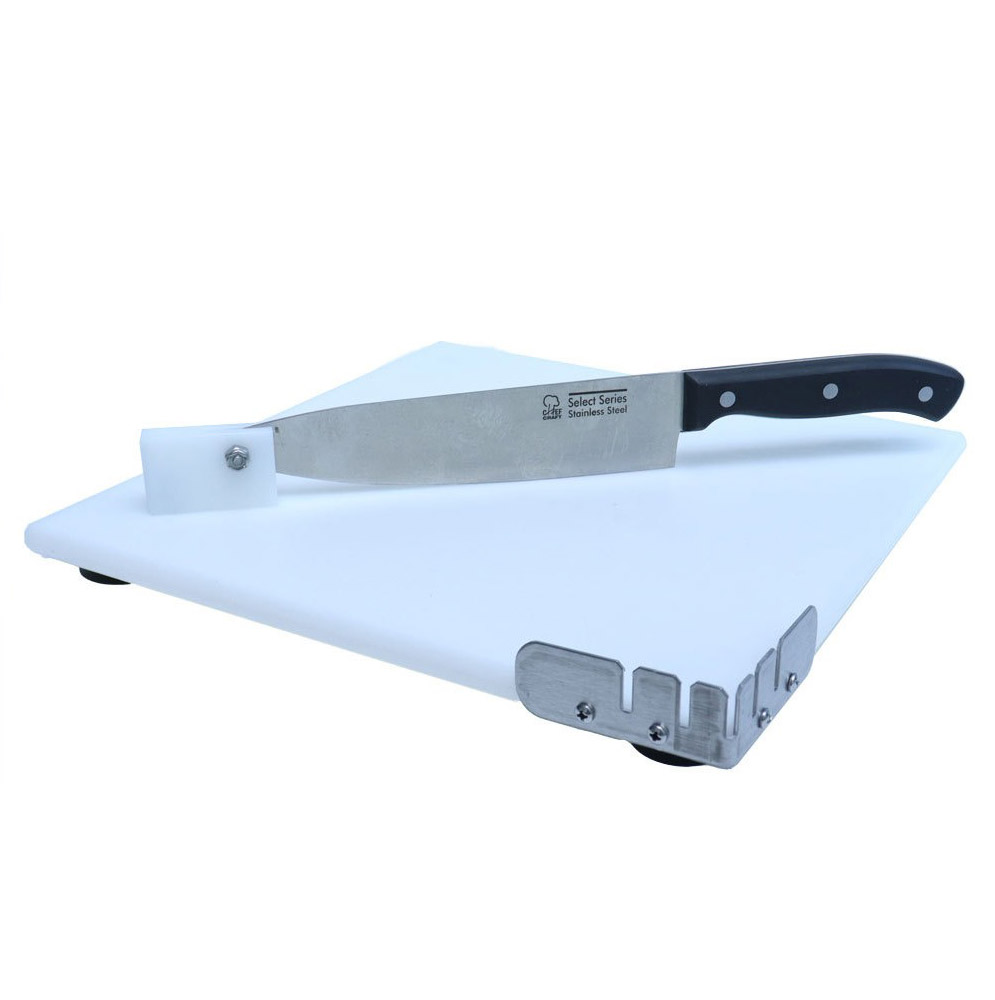 Swivel knife mounted to cutting board.